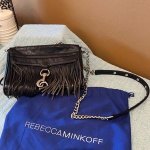Rebecca Minkoff black crossbody bag with fringe.
